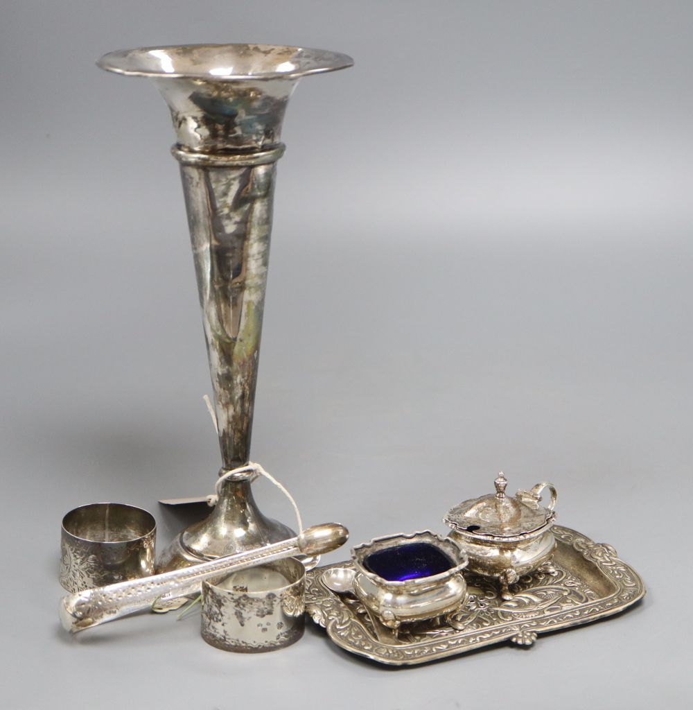 Small silver consisting:- a George V specimen vase, a pair of George III sugar tongs, a George V mustard pot and salt, a Victorian embo